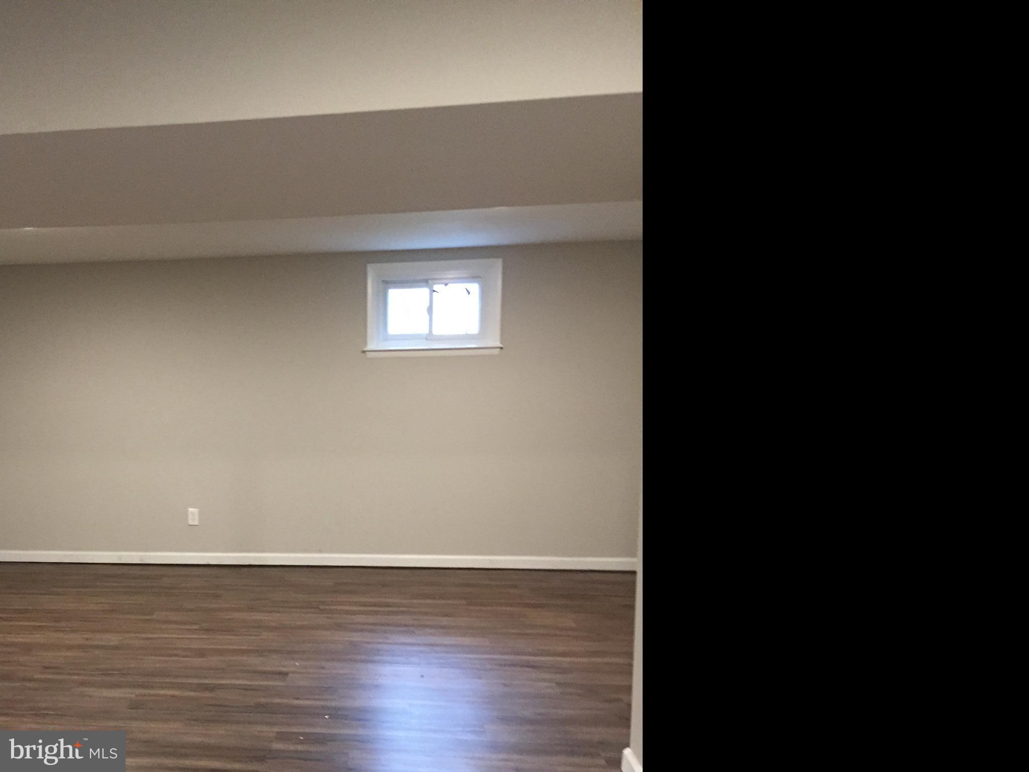 4915 Taft Road Temple Hills, MD 20748 - Photo 24 of 32 Updated Basement walls, lightings, Flooring