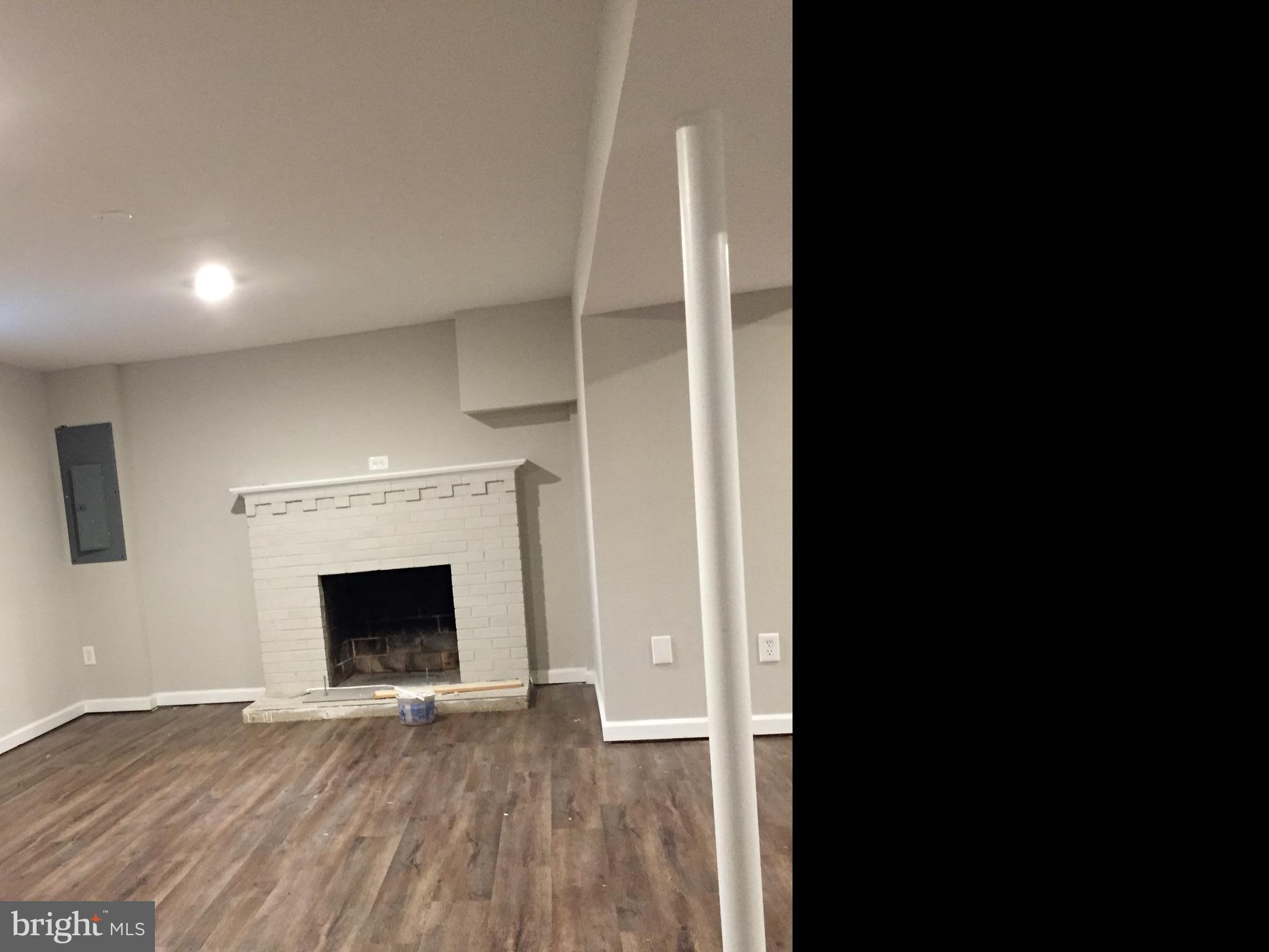 4915 Taft Road Temple Hills, MD 20748 - Photo 25 of 32 Recreation Room with Fireplace