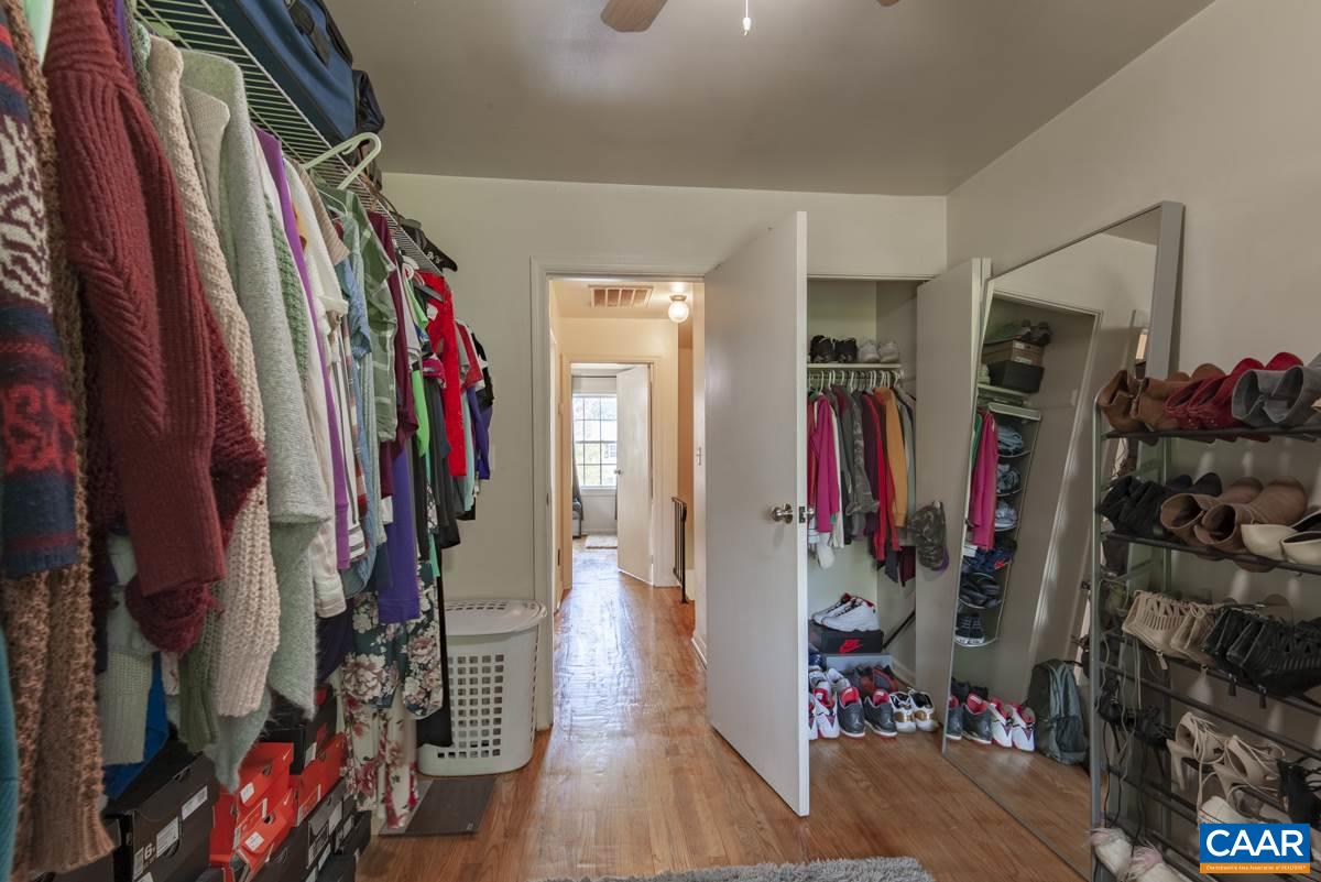 610 Bailey Road Charlottesville, VA 22903 - Photo 22 of 25 a view of walk in closet with clothes