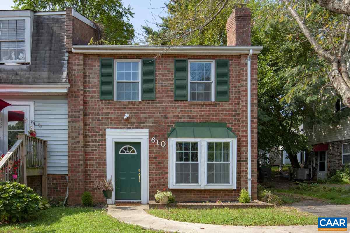 610 Bailey Road Charlottesville, VA 22903 - Photo 23 of 25 a view of a brick house with large windows