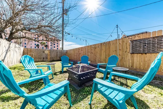 a view of an outdoor sitting area with furniture