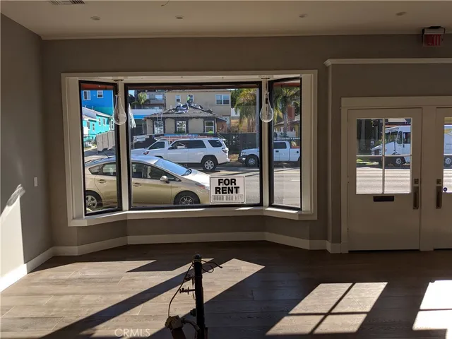 a living room with a table and a window