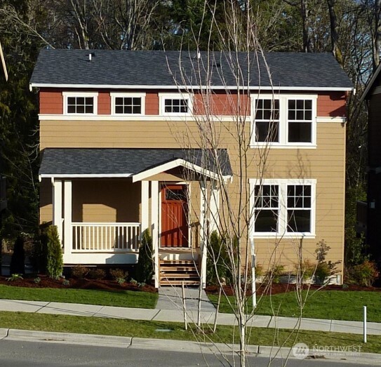 2340 Schley Boulevard Bremerton, WA 98310 - Photo 1 of 9 a view of a house with a yard and large tree