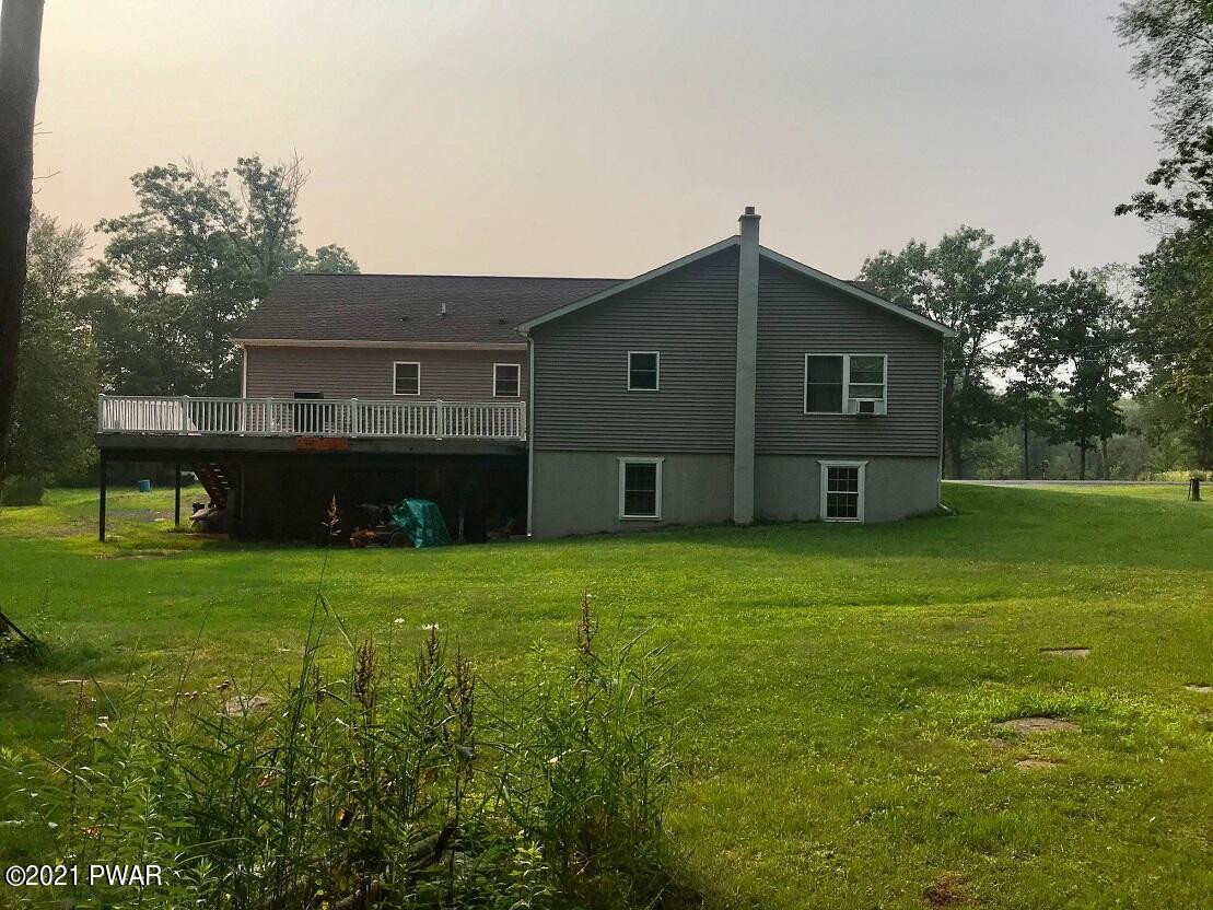 240 Faller Road Lake Ariel, PA 18436 - Photo 4 of 46 back view and yard