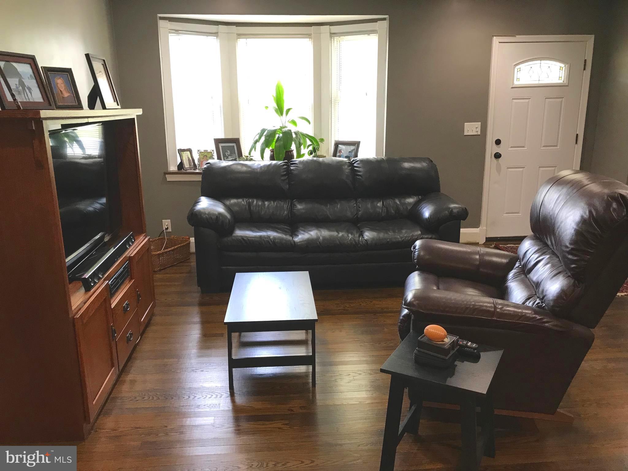 223 Westowne Road Baltimore, MD 21229 - Photo 3 of 21 a living room with furniture and a window