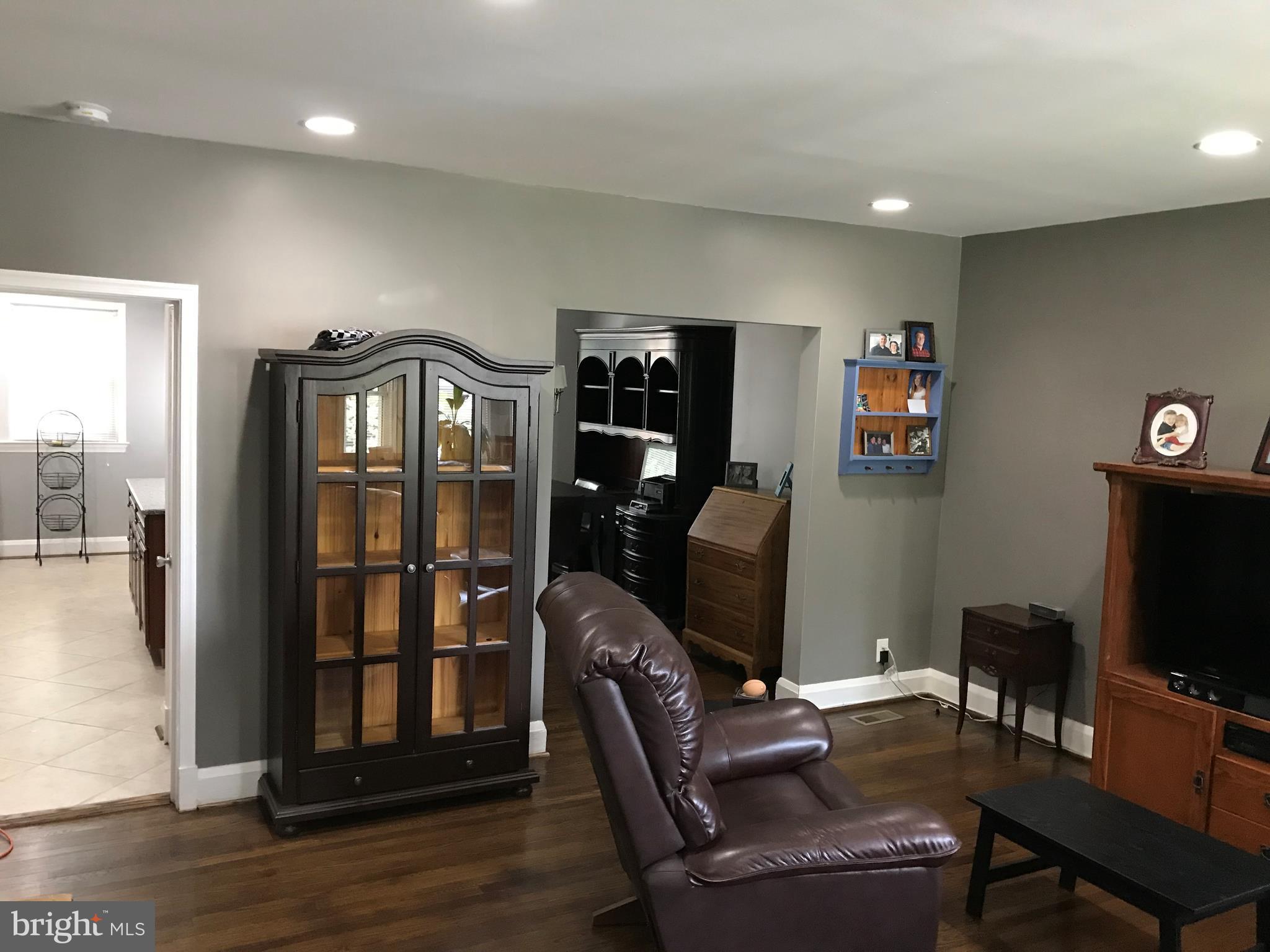 223 Westowne Road Baltimore, MD 21229 - Photo 5 of 21 a workspace with furniture wooden floor and a window