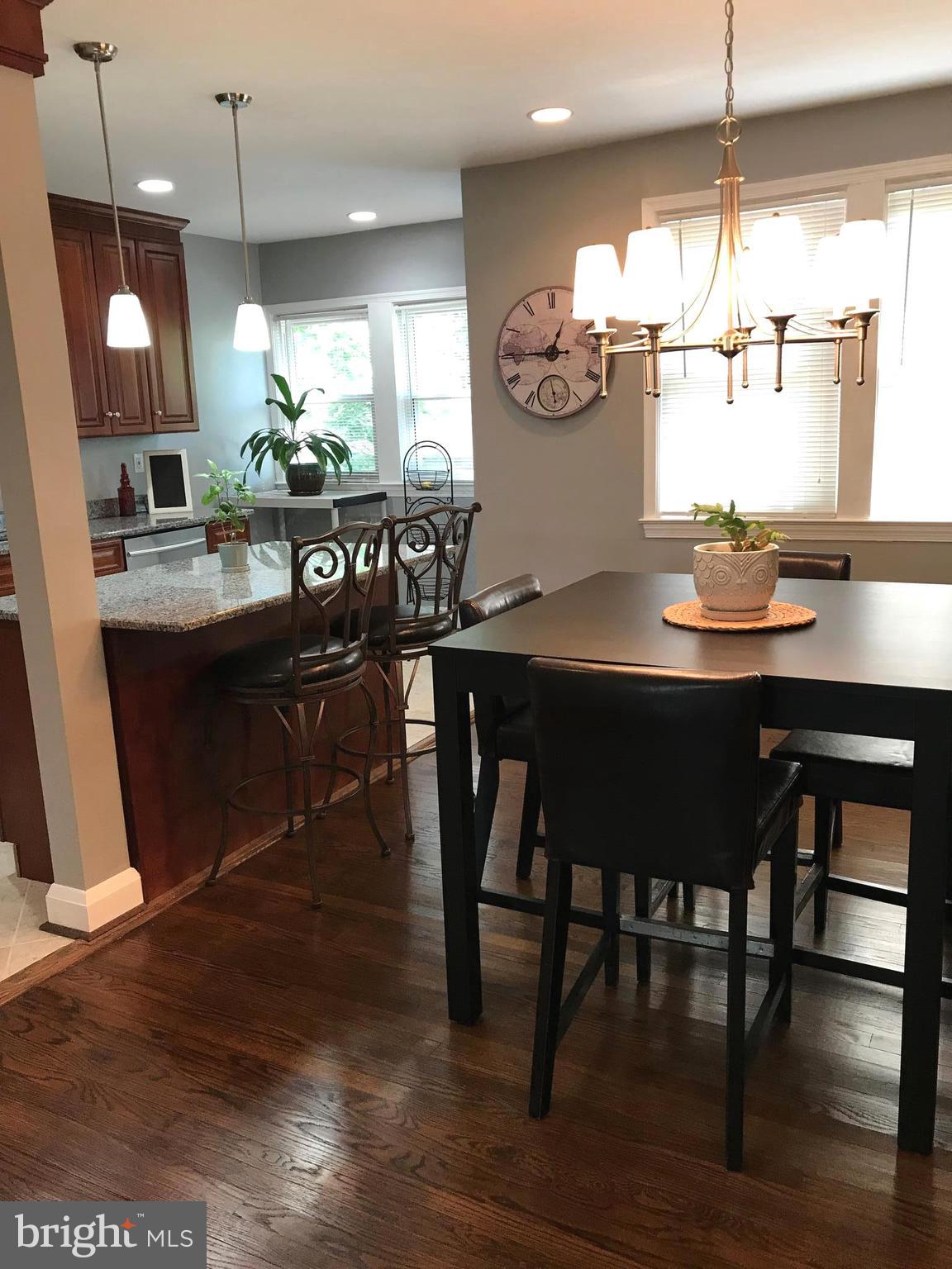 223 Westowne Road Baltimore, MD 21229 - Photo 6 of 21 a kitchen with a table and chairs in it