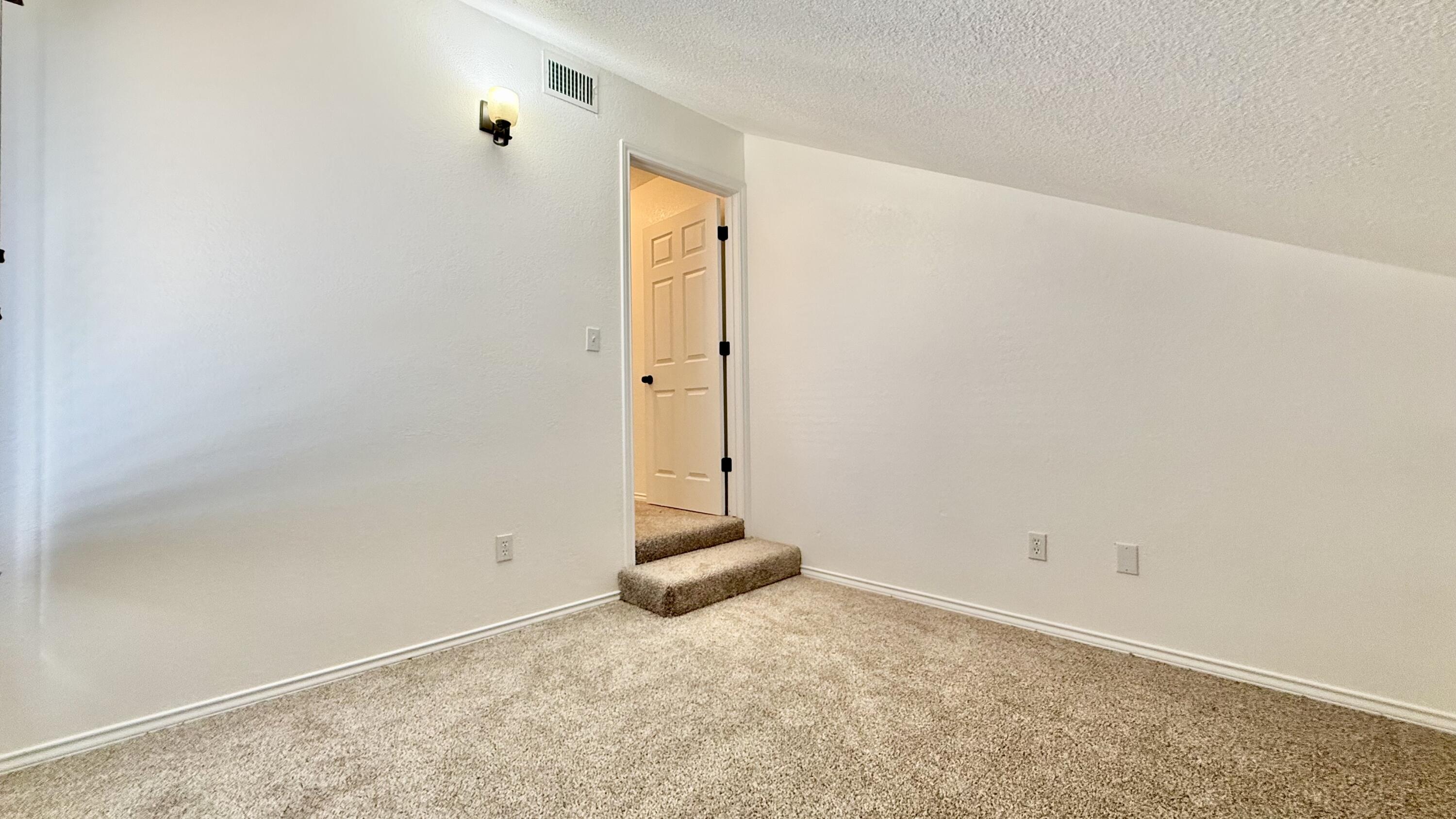 502 North Homestead Avenue Lubbock, TX 79416 - Photo 22 of 33 an empty room with an entryway