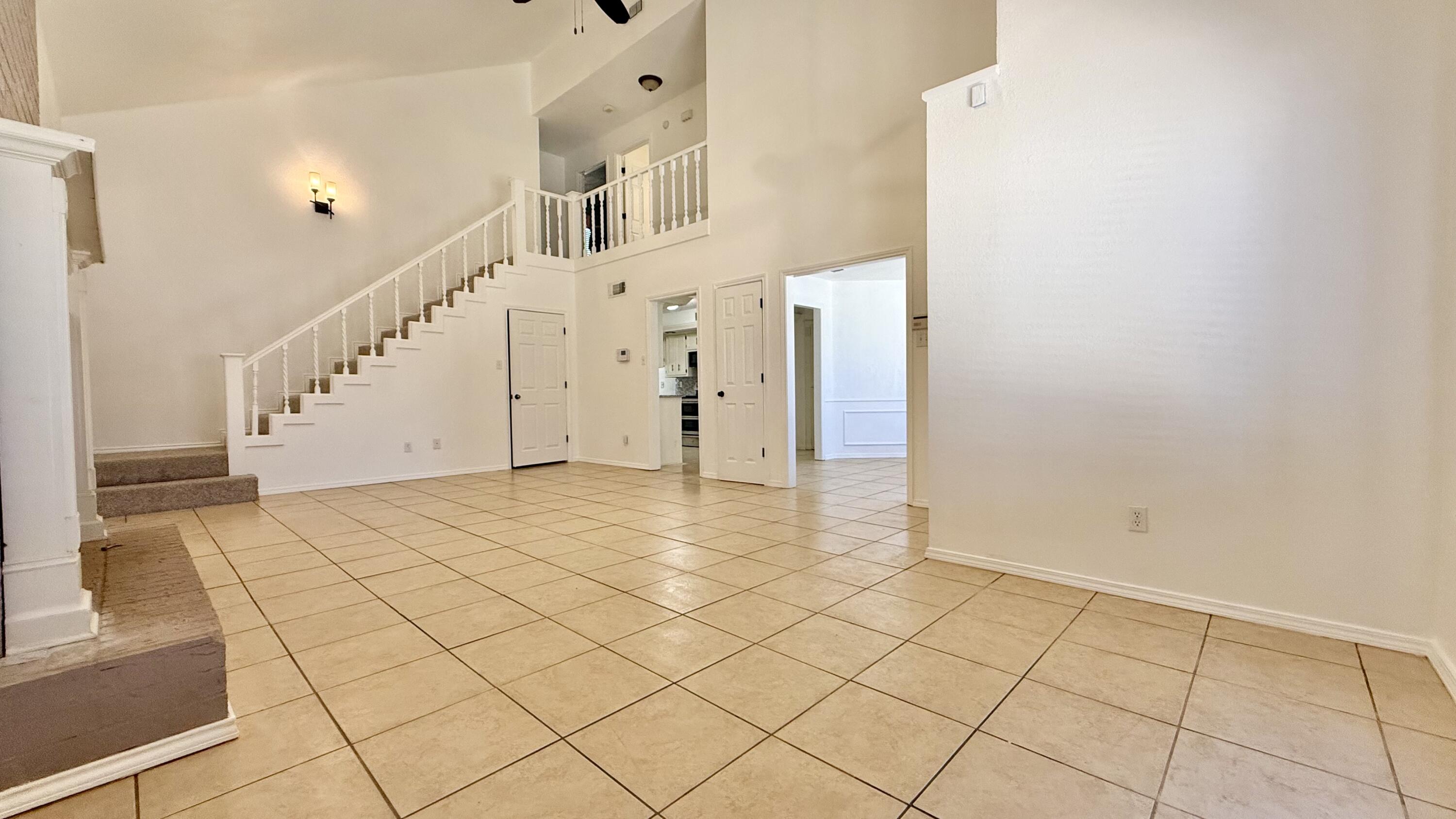 502 North Homestead Avenue Lubbock, TX 79416 - Photo 5 of 33 a view of an entryway with staircase