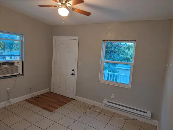 a view of an empty room and window