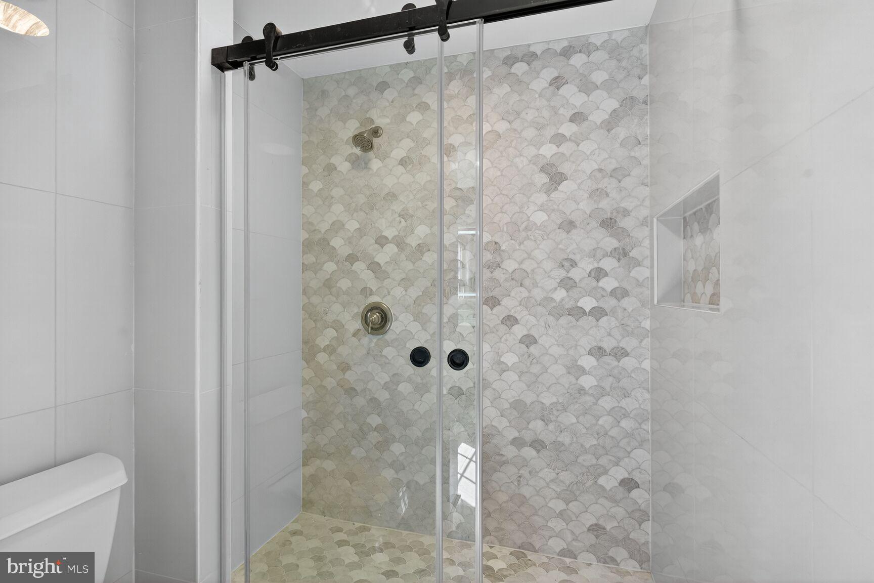 3612 Swann Road Suitland, MD 20746 - Photo 14 of 30 a bathroom with a shower