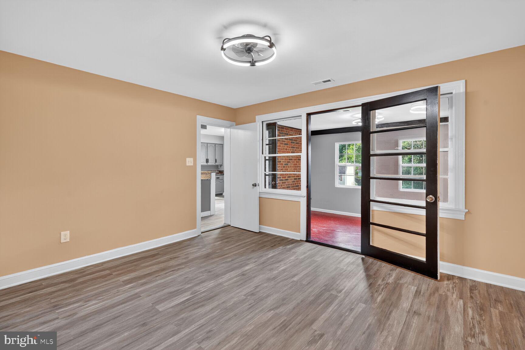 3612 Swann Road Suitland, MD 20746 - Photo 15 of 30 wooden floor in an empty room with a window