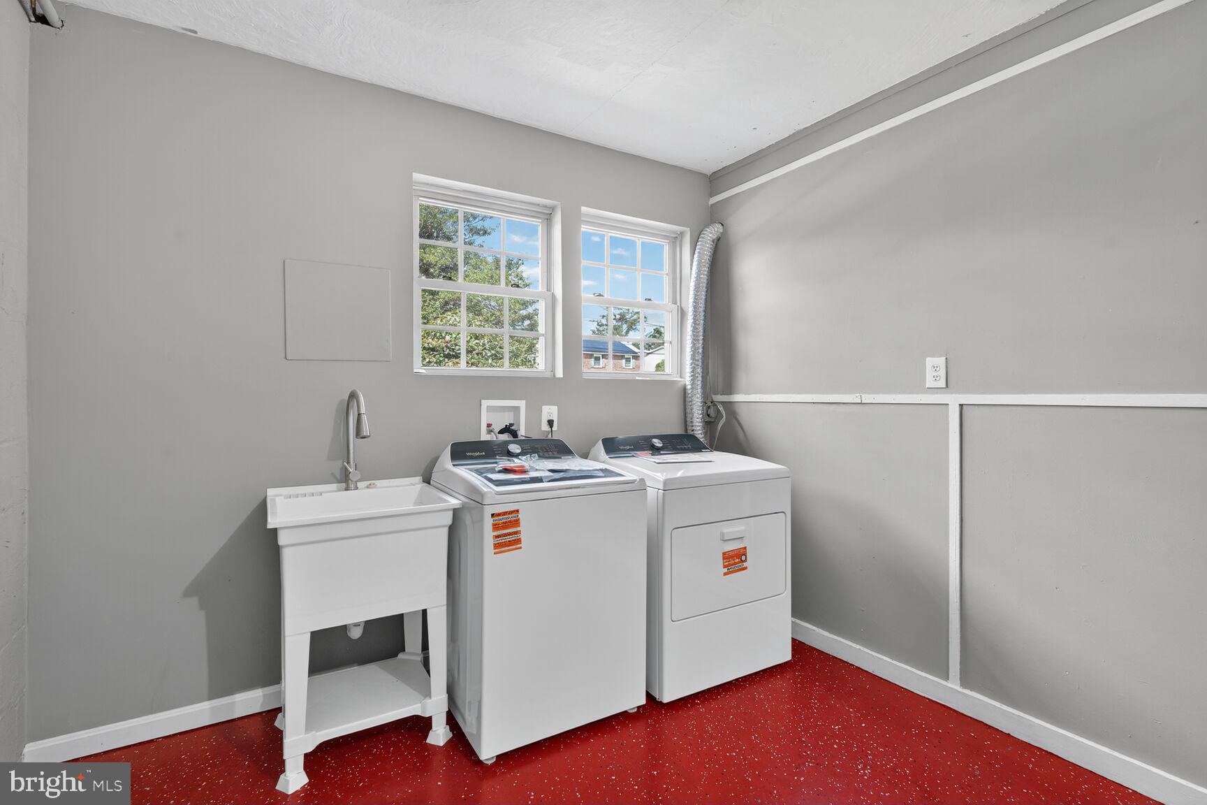 3612 Swann Road Suitland, MD 20746 - Photo 23 of 30 a utility room with dryer and washer