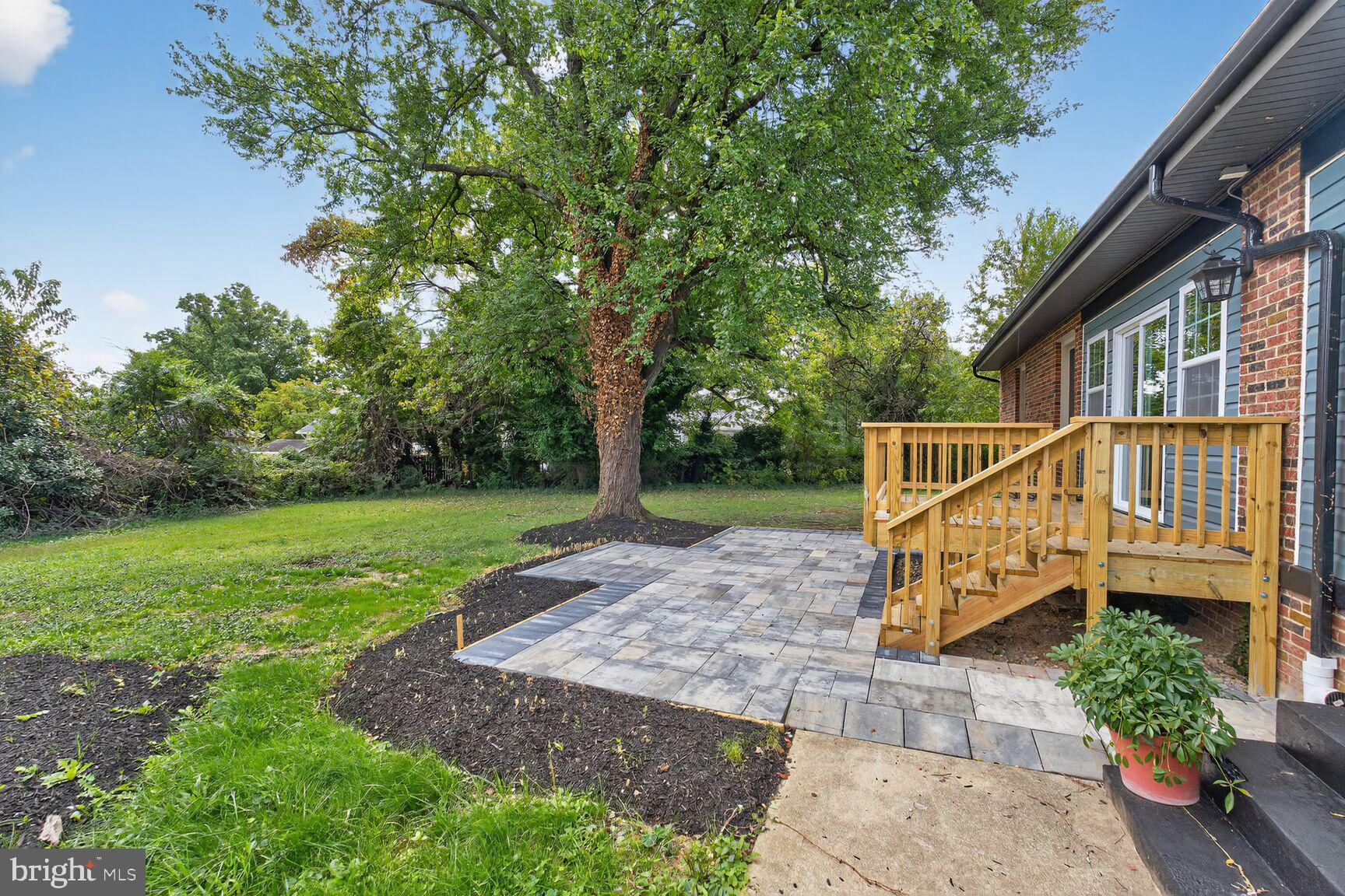 3612 Swann Road Suitland, MD 20746 - Photo 25 of 30 a view of a house with a yard