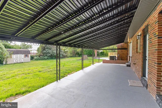 a view of a backyard of the house