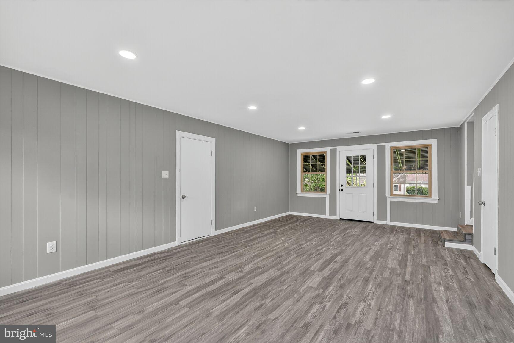 3612 Swann Road Suitland, MD 20746 - Photo 6 of 30 wooden floor in an empty room with a window