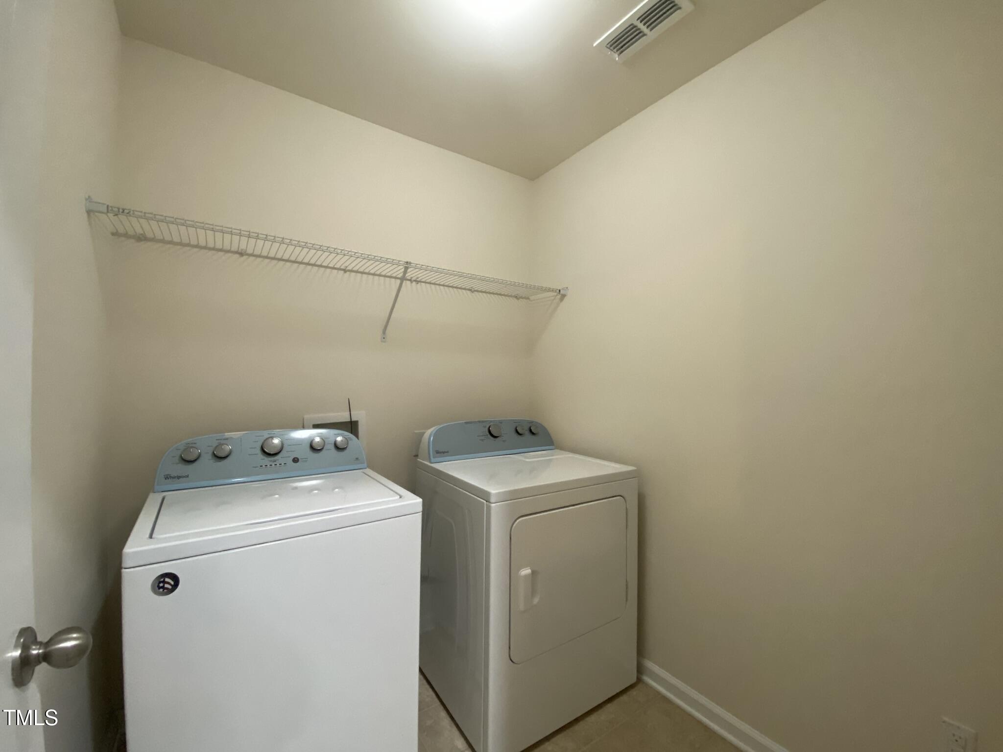 3545 Massey Ridge Court Raleigh, NC 27616 - Photo 23 of 38 a utility room with dryer and washer