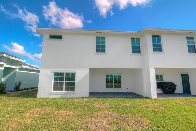 a view of a house with a swimming pool