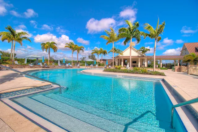 a view of a yard with swimming pool