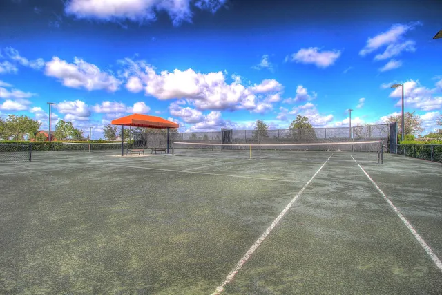 a view of an ocean and swimming pool