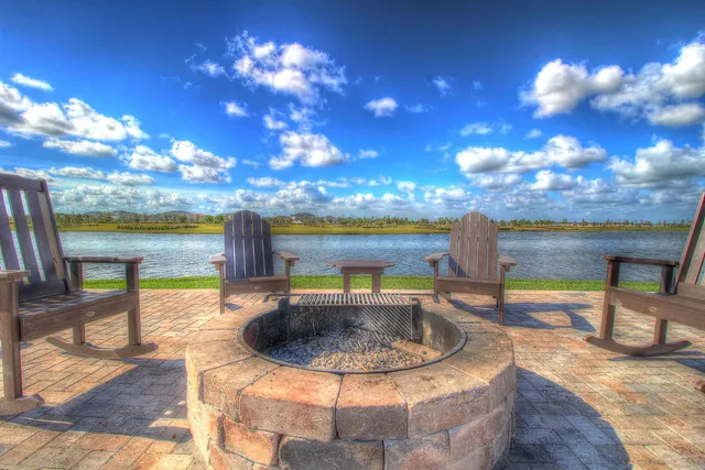 a view of a lake in between of the house