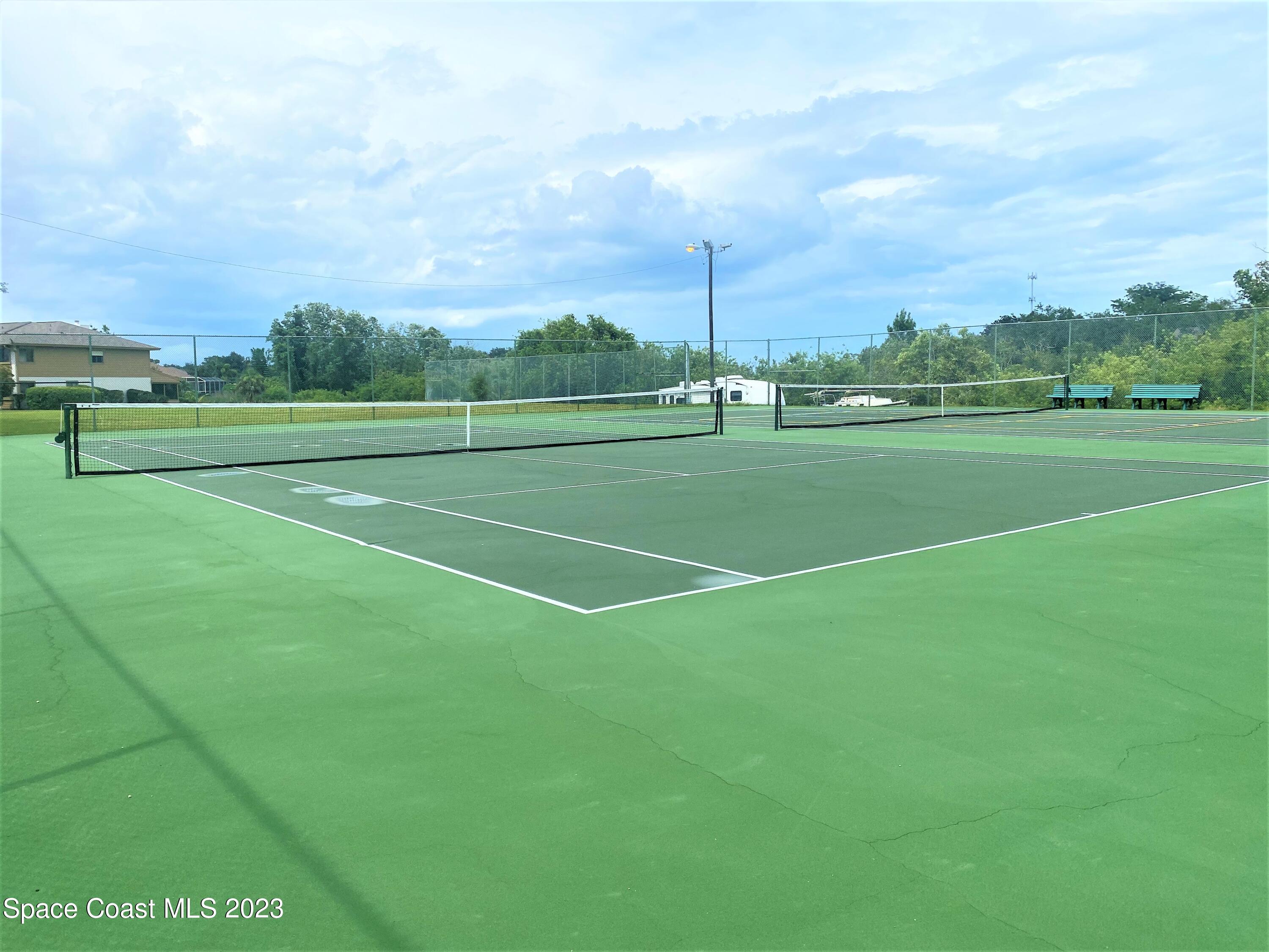 1850 Quail Trail Melbourne, FL 32935 - Photo 21 of 23 a view of a tennis court
