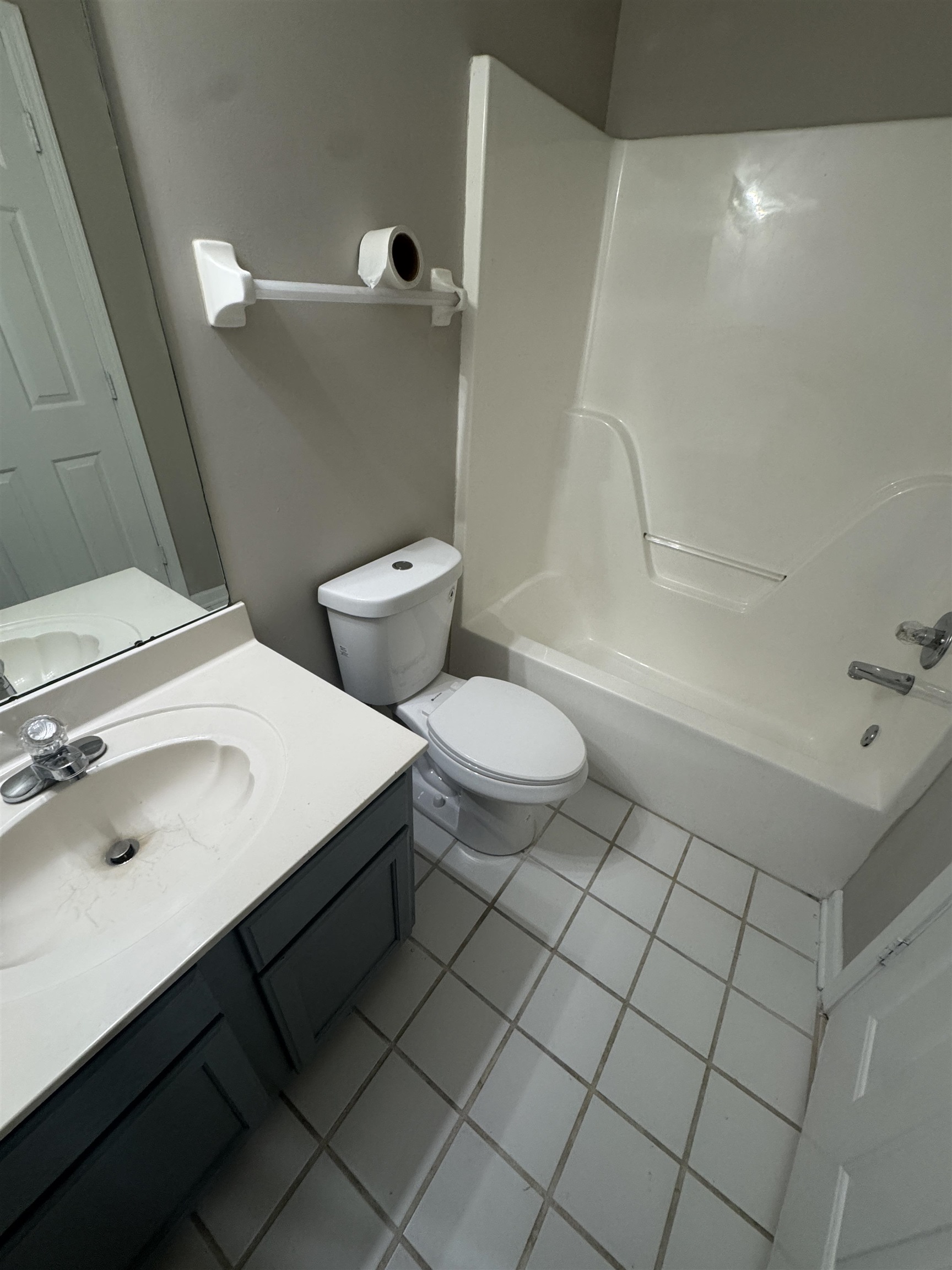 5457 Sundale Way South Memphis, TN 38135 - Photo 16 of 23 Bathroom featuring vanity, light tile patterned floors, and shower / bath combination
