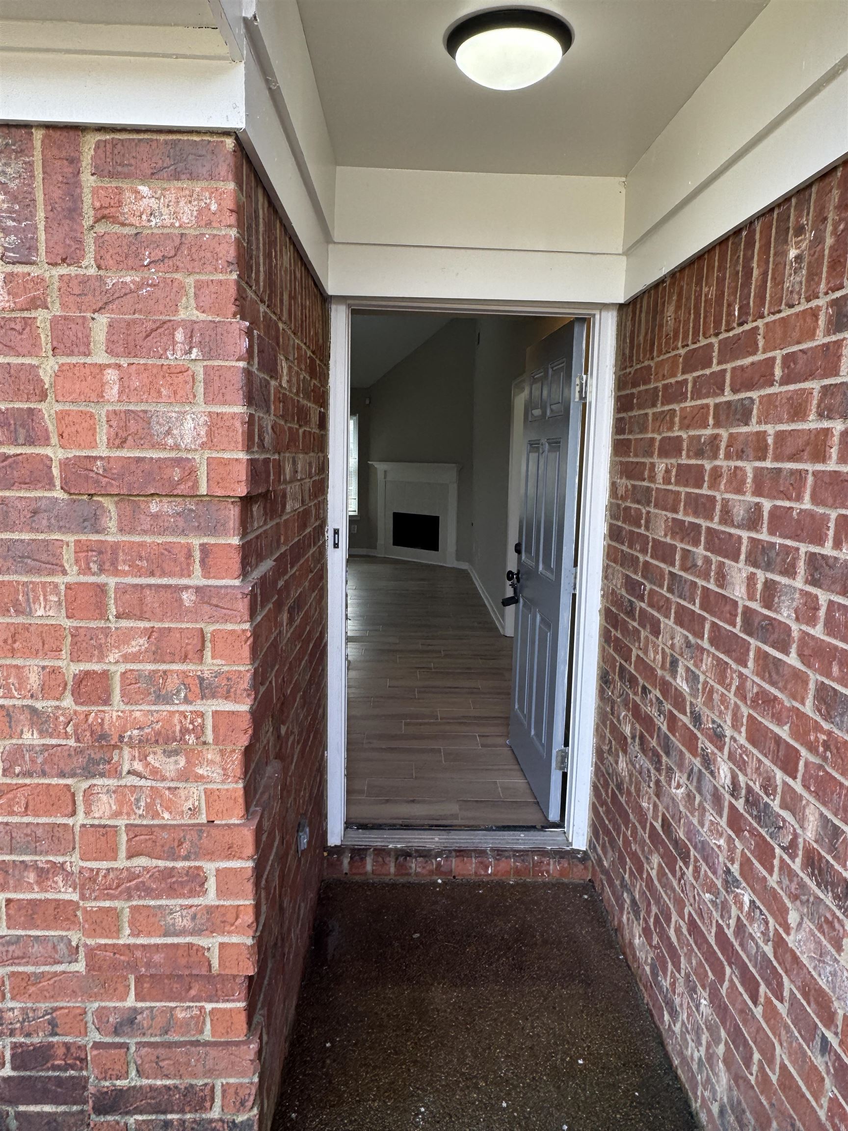 5457 Sundale Way South Memphis, TN 38135 - Photo 2 of 23 View of exterior entry featuring brick siding