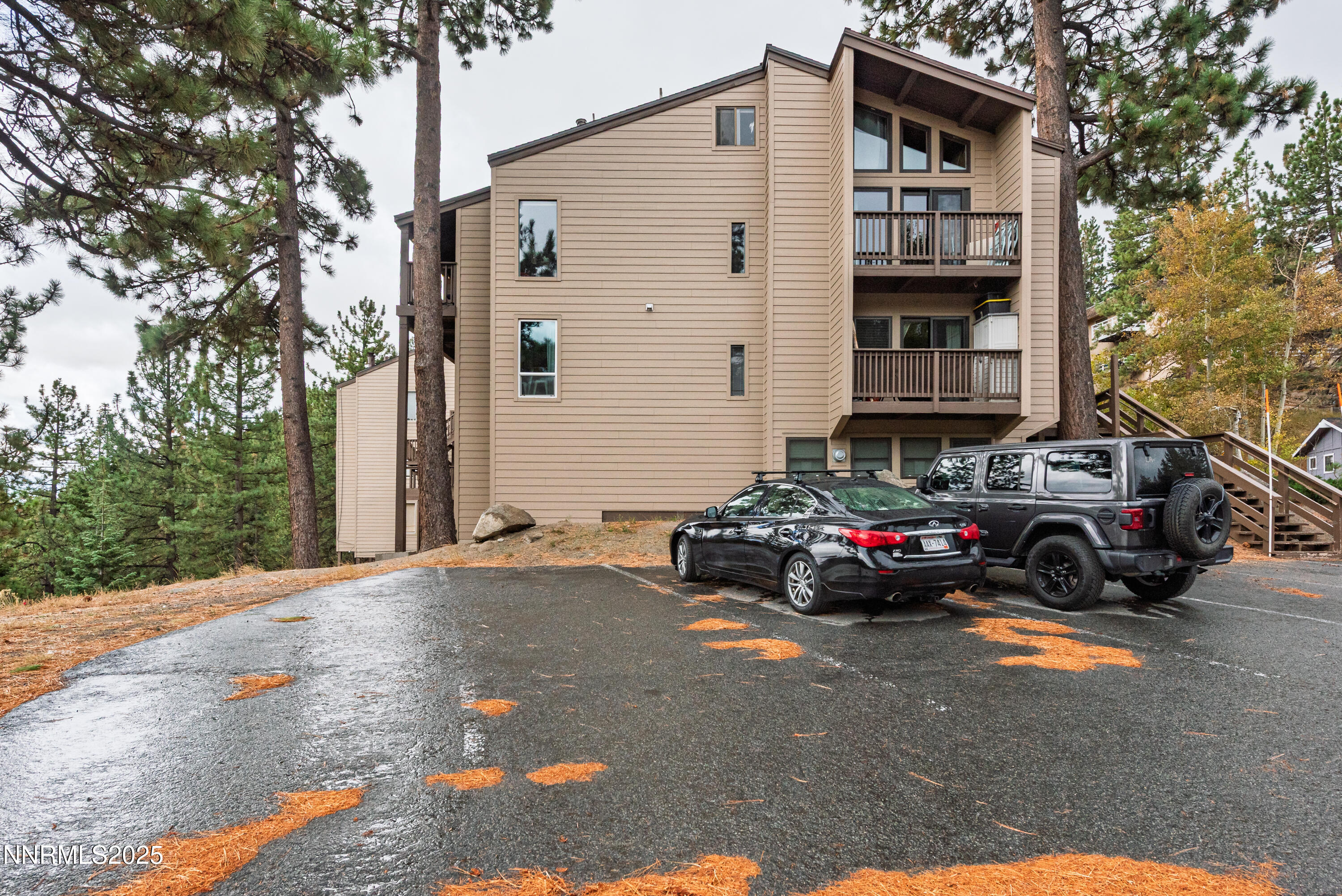 a view of street with parked cars