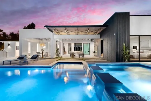 a view of a living room with kitchen island