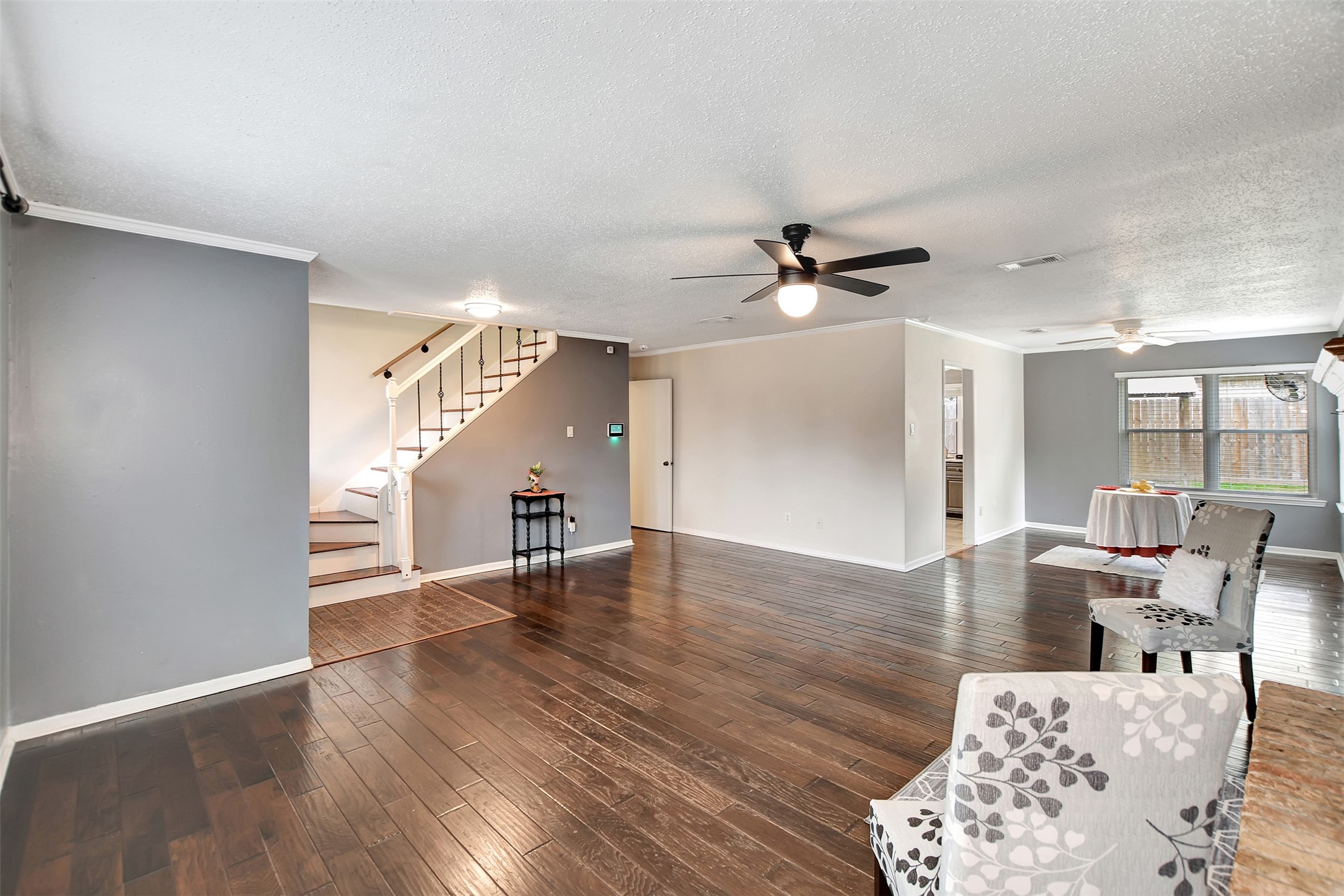 8 Arlington Street Conroe, TX 77301 - Photo 13 of 43 a view of a livingroom with furniture and wooden floor