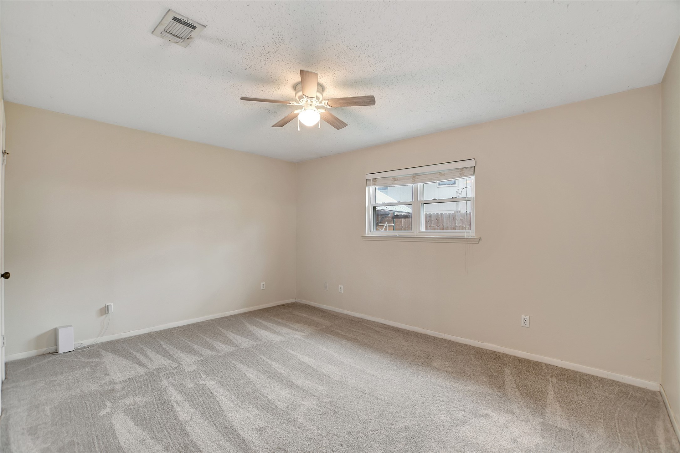 8 Arlington Street Conroe, TX 77301 - Photo 23 of 43 a view of empty room with window