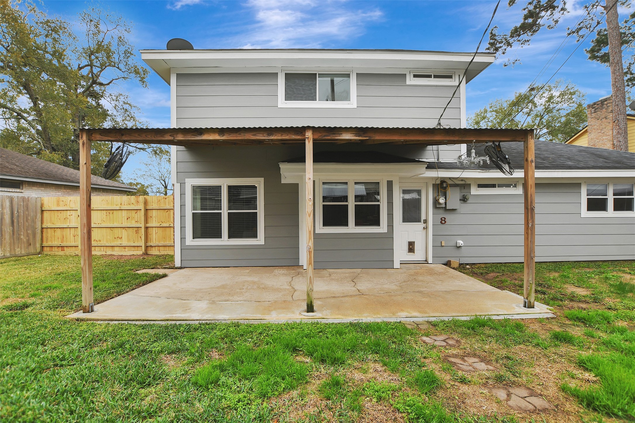 8 Arlington Street Conroe, TX 77301 - Photo 35 of 43 a view of a house with backyard