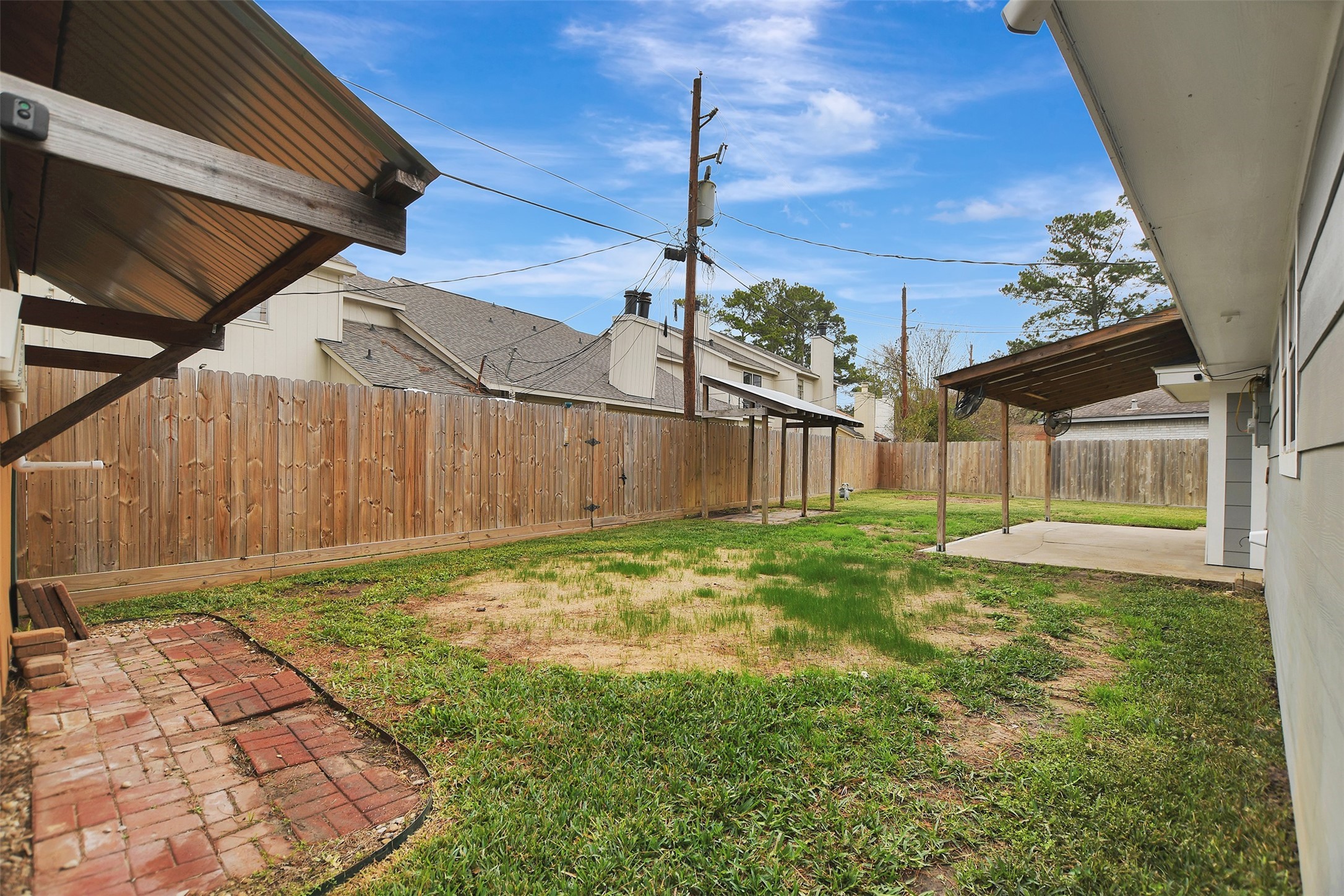 8 Arlington Street Conroe, TX 77301 - Photo 40 of 43 a backyard of a house