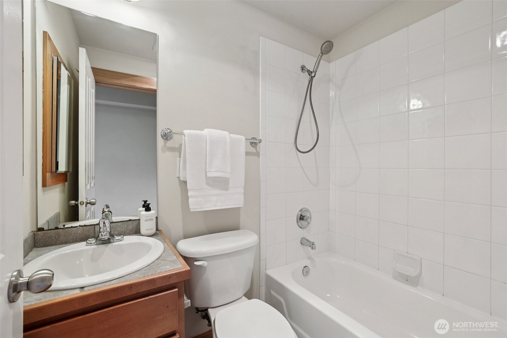 9047 17th Avenue Southwest, Unit A Seattle, WA 98106 - Photo 11 of 29 a bathroom with a sink toilet and shower