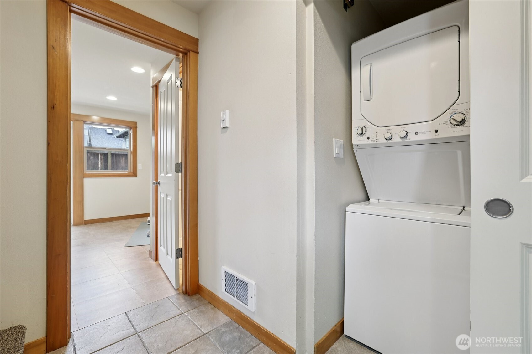 9047 17th Avenue Southwest, Unit A Seattle, WA 98106 - Photo 13 of 29 a view of a storage & utility room with washer and dryer