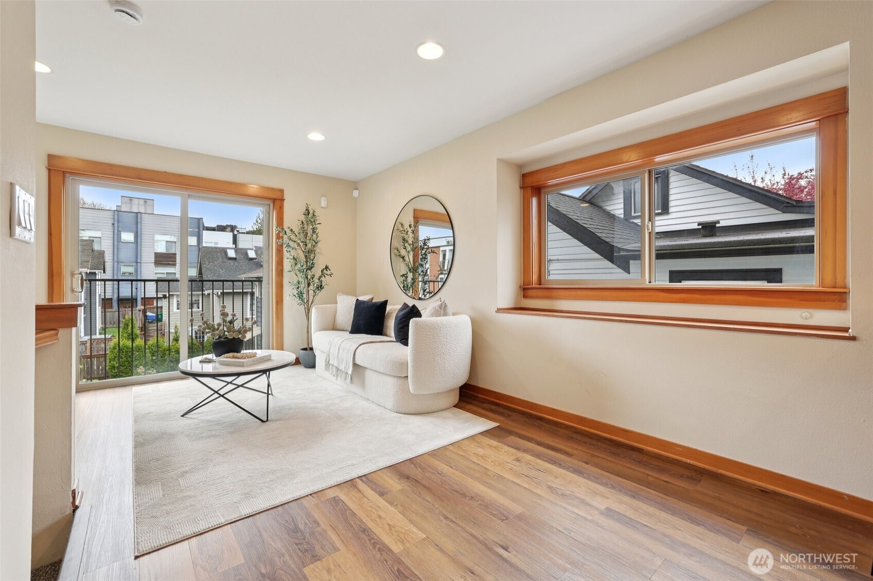 9047 17th Avenue Southwest, Unit A Seattle, WA 98106 - Photo 15 of 29 a living room with furniture and a large window