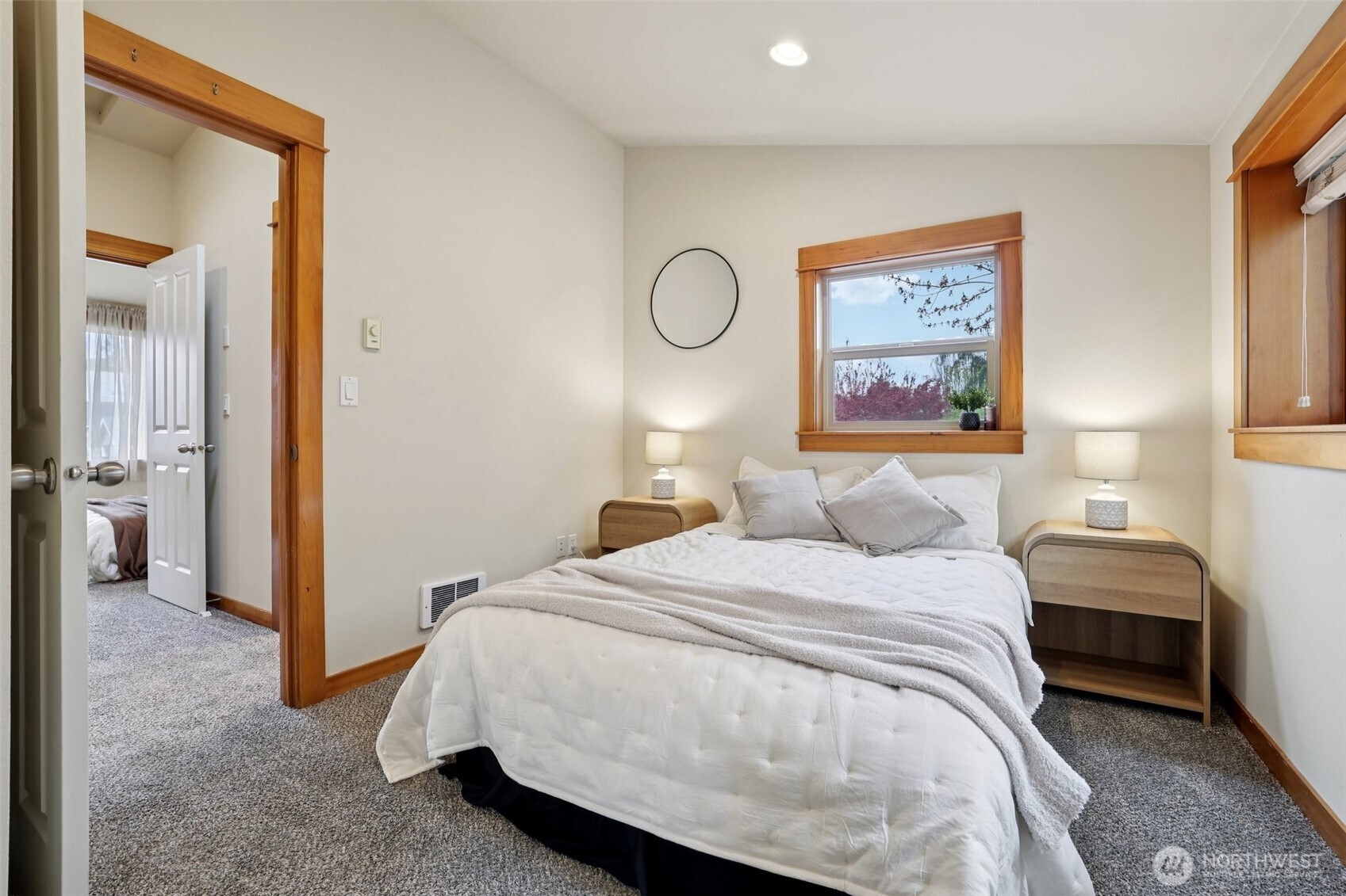 9047 17th Avenue Southwest, Unit A Seattle, WA 98106 - Photo 20 of 29 a bedroom with a bed and a painting on the wall