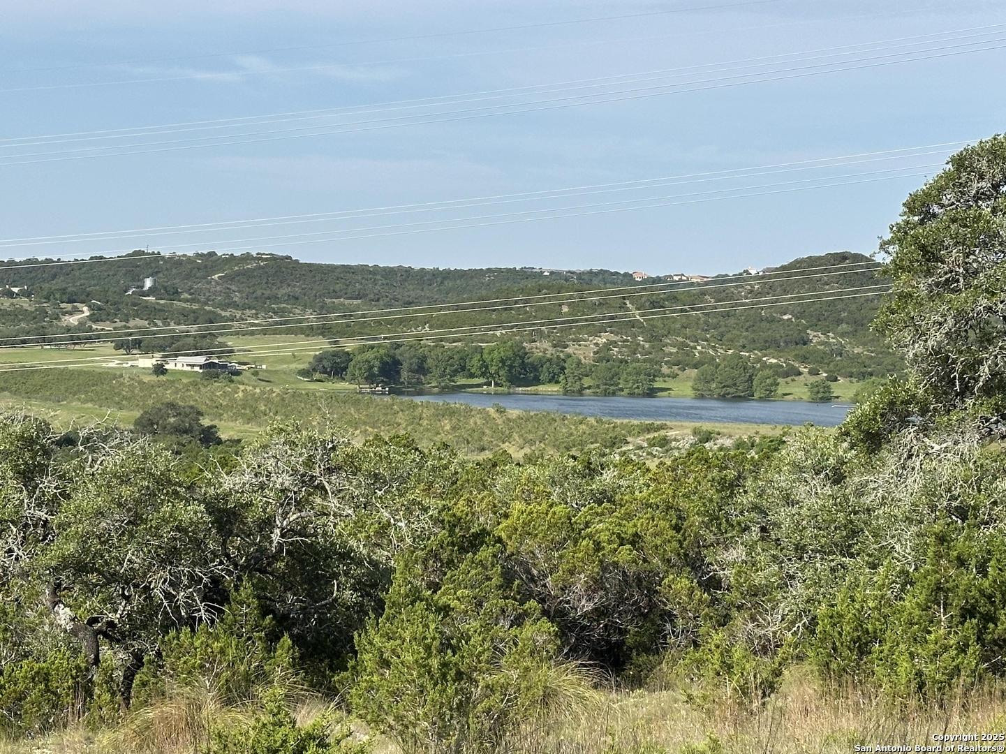 10205 Johns Road, Unit 2 Boerne, TX 78006 - Photo 6 of 11 a view of lake with mountain