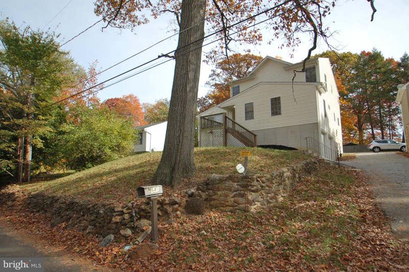 3641 Clifmar Road Baltimore, MD 21244 - Photo 24 of 27 a view of a house with a yard