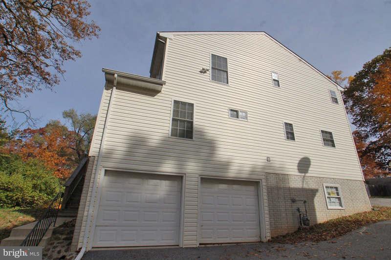 3641 Clifmar Road Baltimore, MD 21244 - Photo 25 of 27 a view of a house with a yard