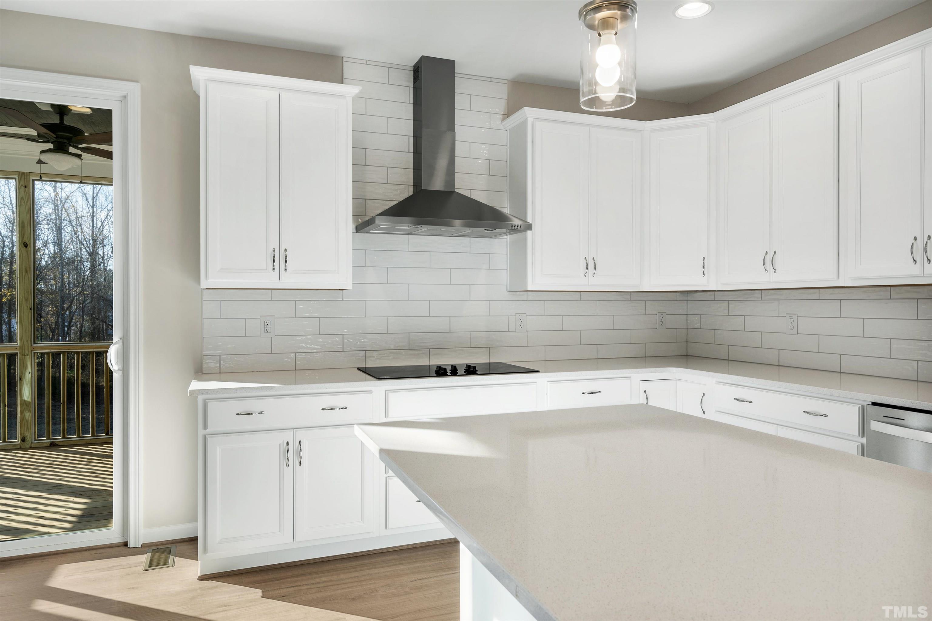 177 Karlov Road Garner, NC 27529 - Photo 12 of 39 a kitchen with a sink cabinets and appliances
