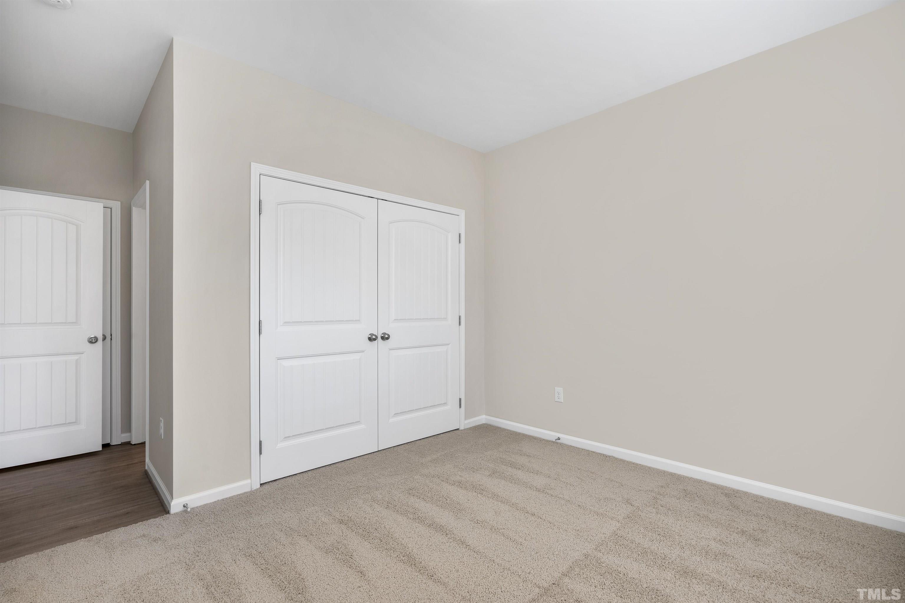 177 Karlov Road Garner, NC 27529 - Photo 17 of 39 a view of an empty room