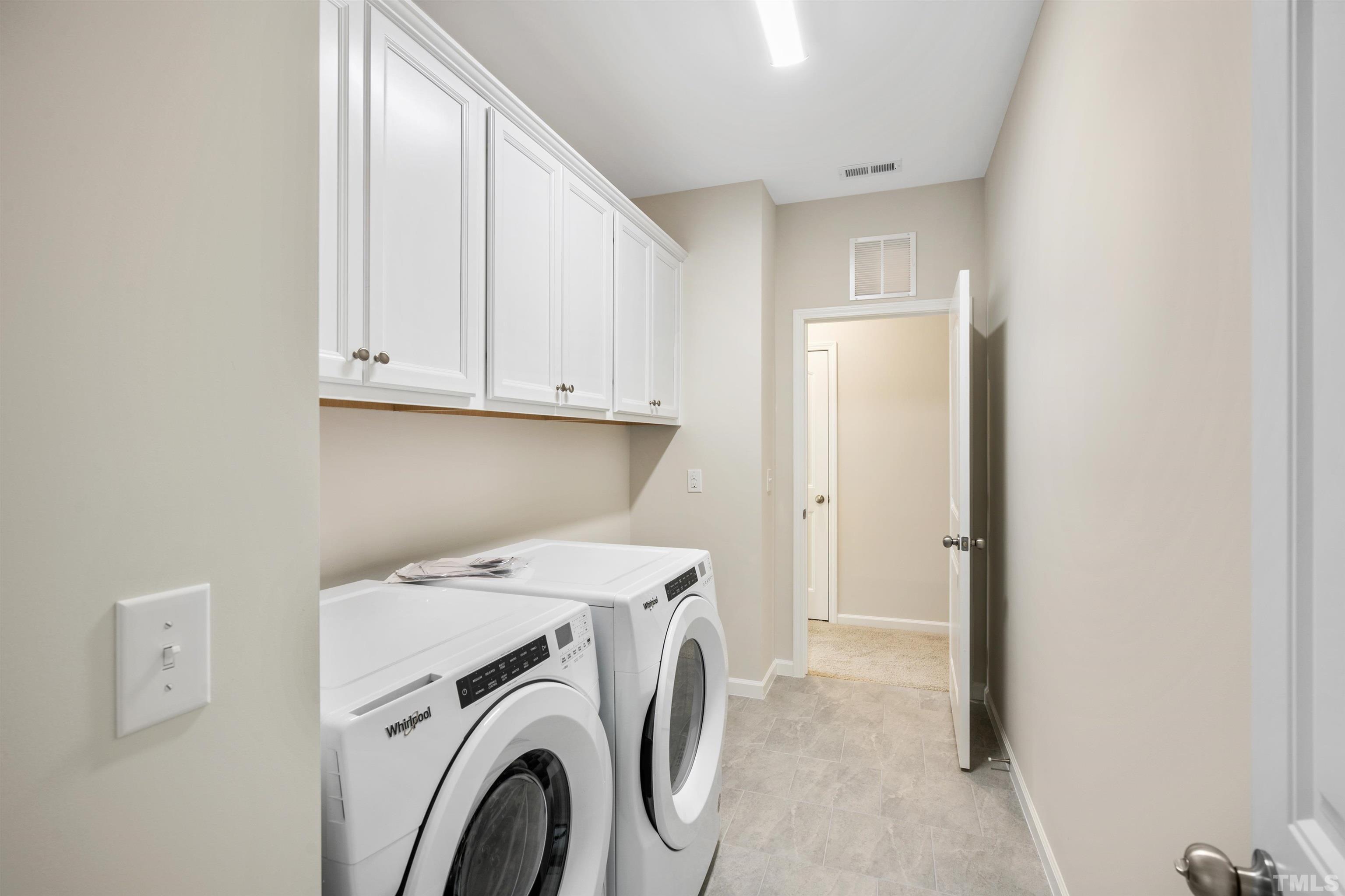 177 Karlov Road Garner, NC 27529 - Photo 34 of 39 a utility room with dryer and washer