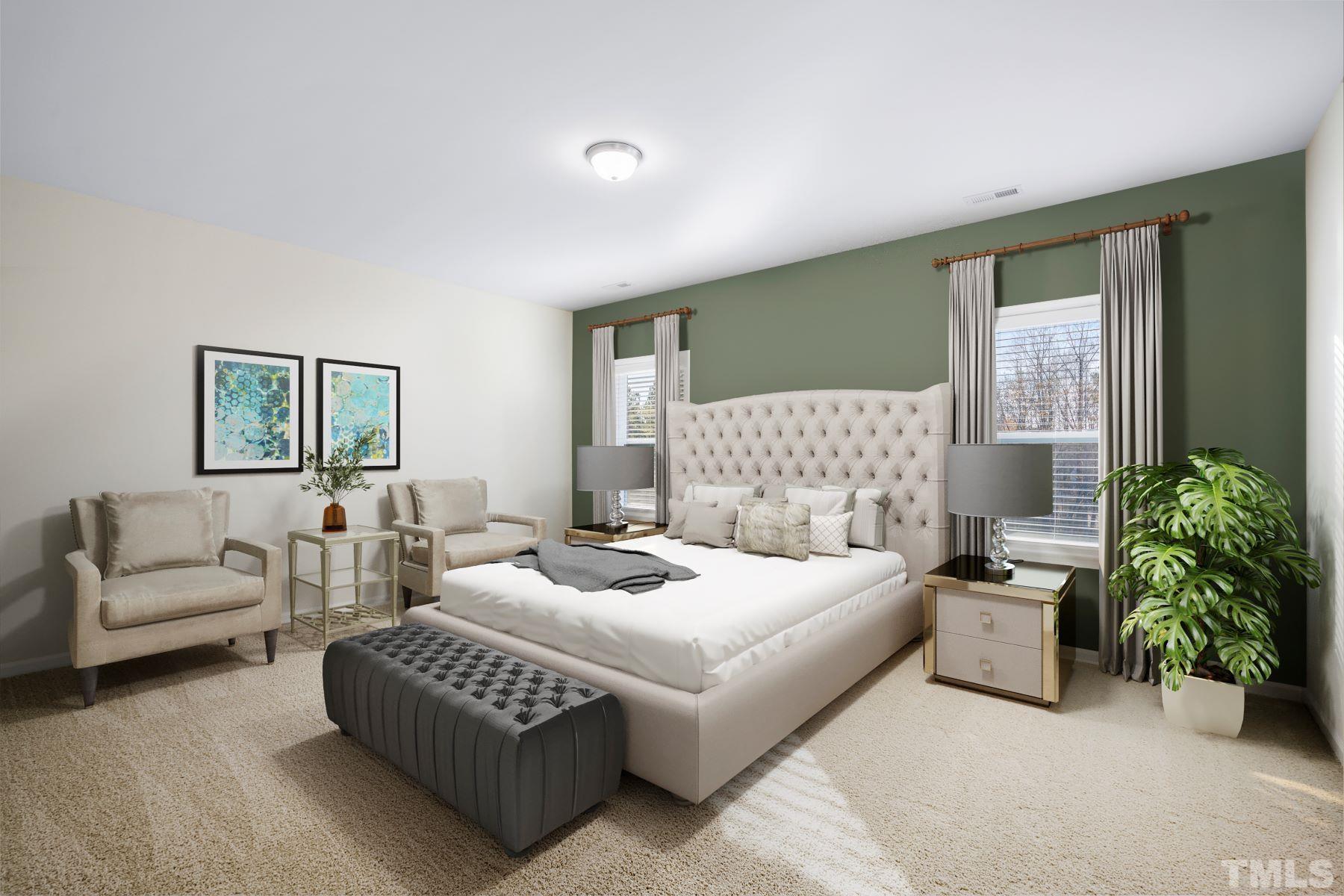 177 Karlov Road Garner, NC 27529 - Photo 6 of 39 a bedroom with a bed and a couch