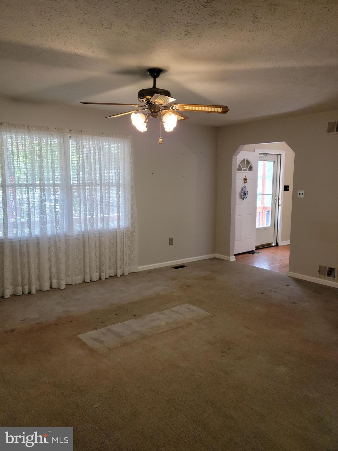 309 Windy Pines Road Front Royal, VA 22630 - Photo 7 of 48 Living room with ceiling fan