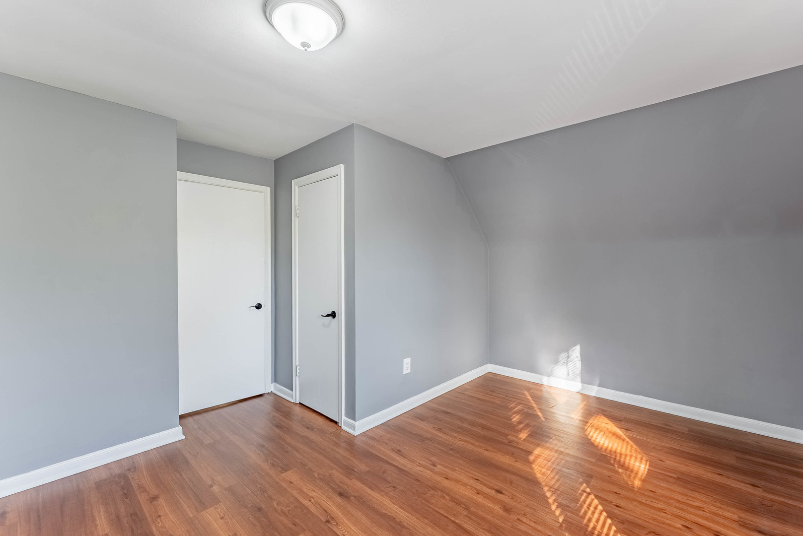 2345 Ridgeland Avenue, Unit 2 Berwyn, IL 60402 - Photo 13 of 18 a view of empty room with wooden floor