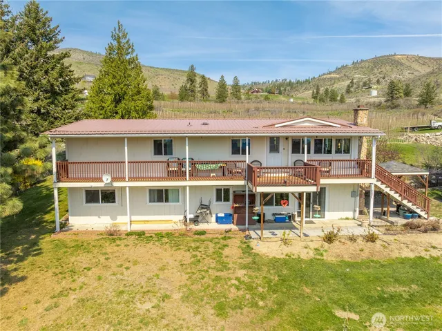 a view of a large building with a large pool