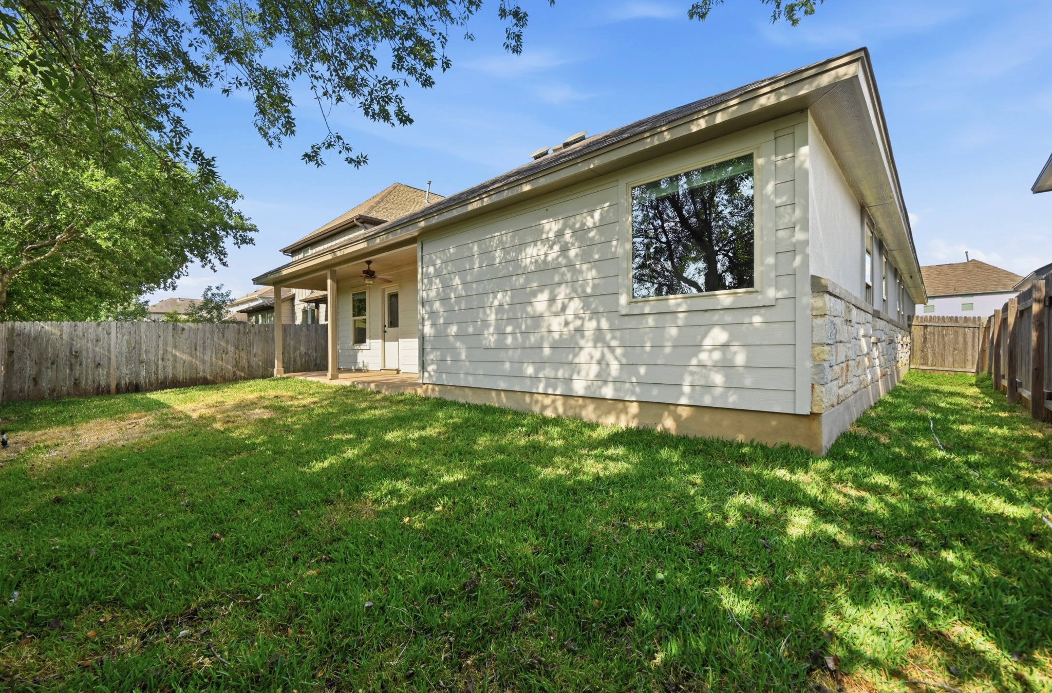 13009 Olivers Way Manchaca, TX 78652 - Photo 30 of 37 a view of a house with a yard