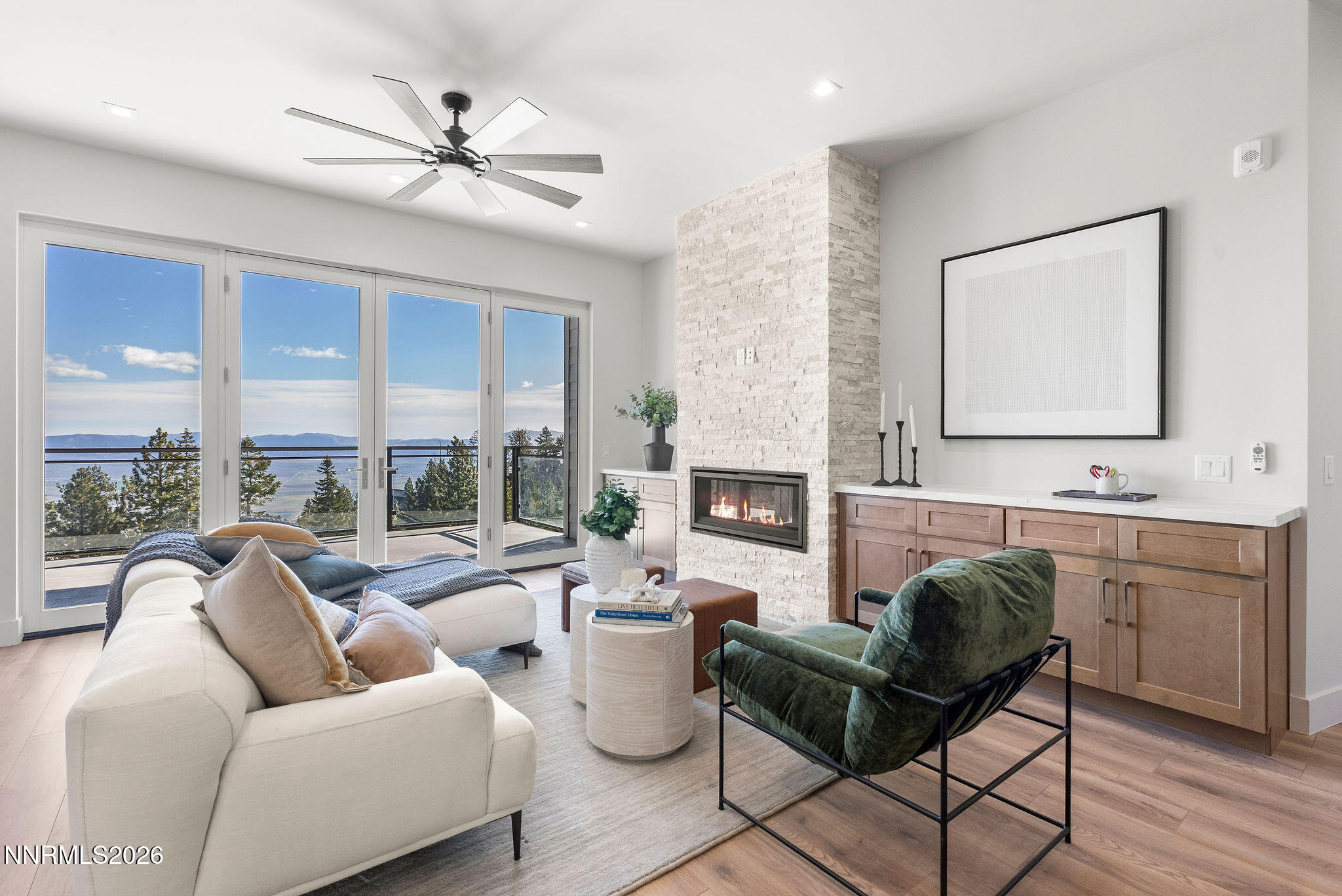 323 Tramway Drive, Unit 107 Stateline, NV 89449 - Photo 1 of 27 a living room with furniture and a large window